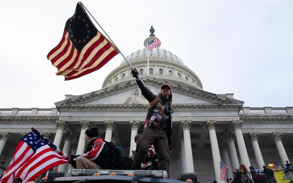 Pro-Trump activists storm the Capitol in 2021 - Shutterstock