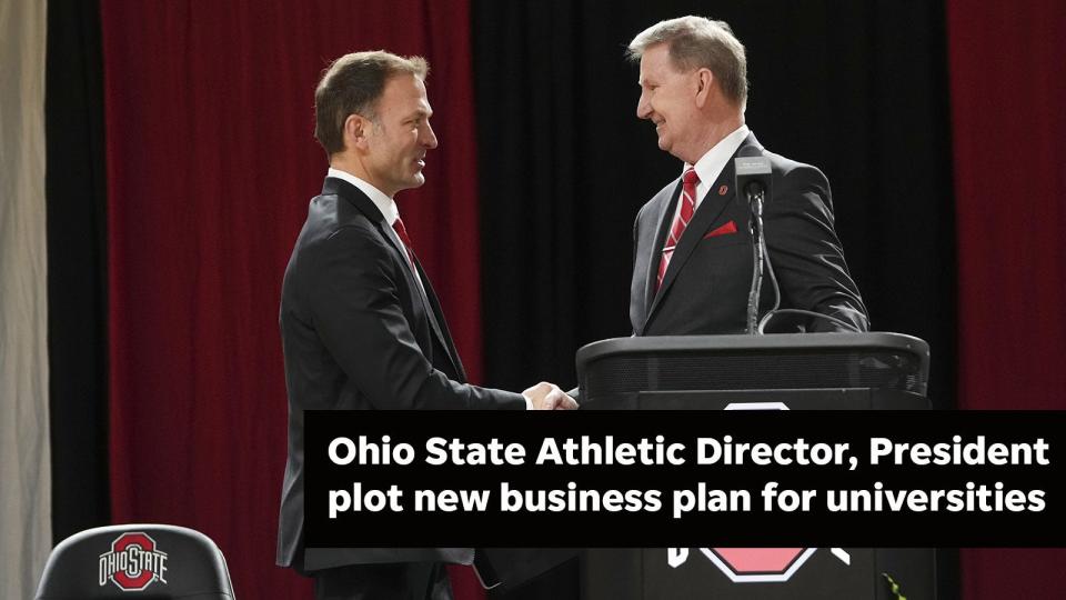 Jan 17, 2024; Columbus, OH, USA; President Ted Carter shakes hands with Ross Bjork during an introductory press conference for Ohio State University’s new athletic director at the Covelli Center.