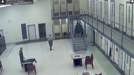 Jerome Hill climbs the stairs at the Chatham County Detention Center shortly before his suicide in Savannah