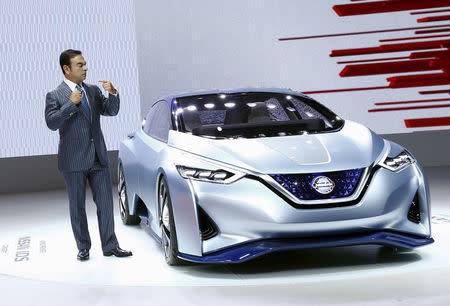 Carlos Ghosn, CEO of the Renault-Nissan Alliance, presents the Nissan IDS concept car at the 44th Tokyo Motor Show in Tokyo October 28, 2015. REUTERS/Thomas Peter/Files