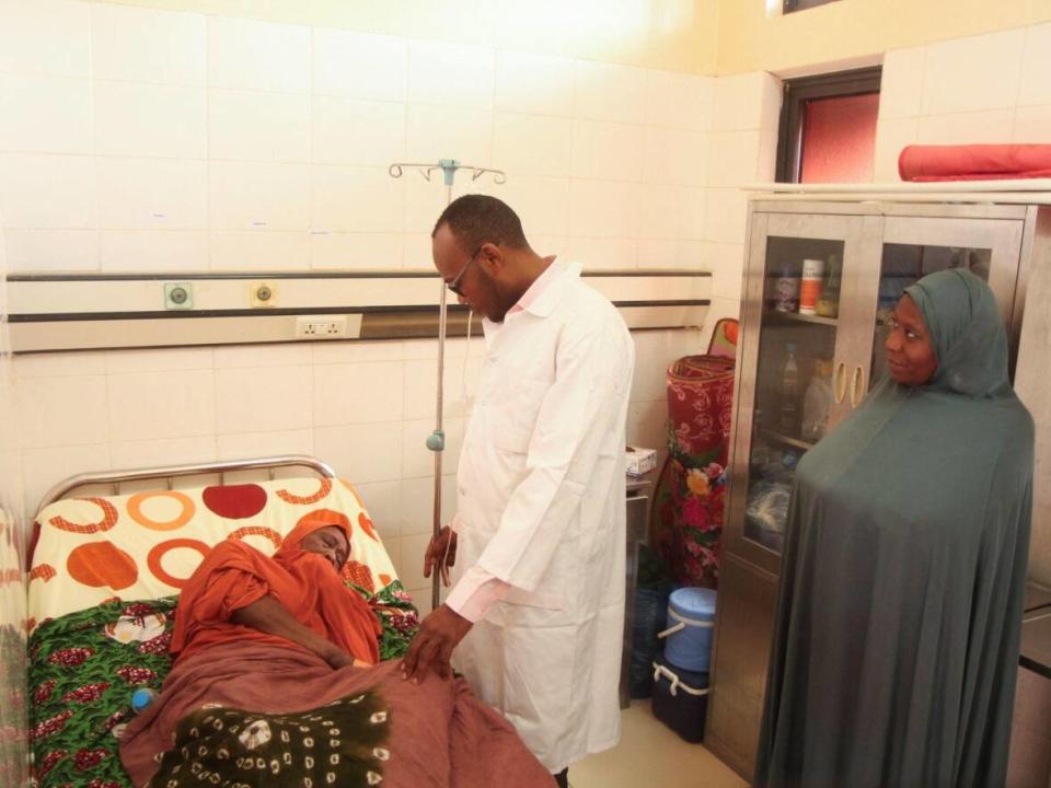 An elderly woman hospitalized for dehydration during the recent record heat wave, receives IV drip while she is being consulted at an hospital in Niamey, Niger. West Africa experienced a brutal heat wave this year that would not have been possible without human-caused climate change, a new report says. (Mahamadou Hamidou/Reuters - image credit)