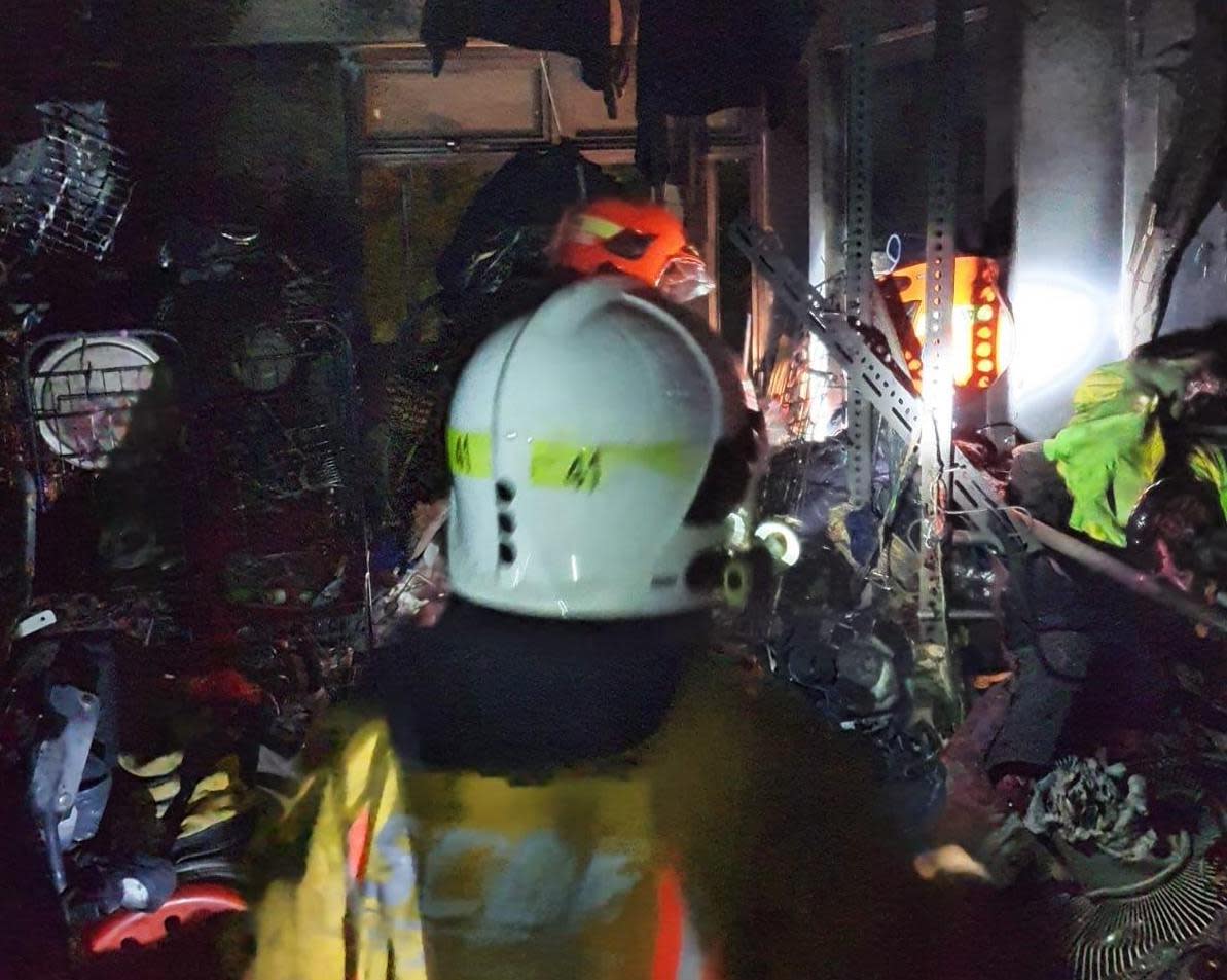 SCDF firefighters at a Block 210A Bukit Batok flat following a fire there on 1 November 2019. PHOTO: SCDF 