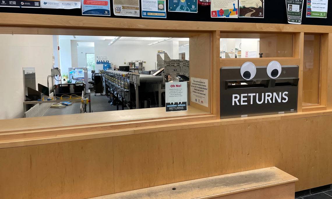 The steps at the Chapel Hill Public Library are worn from years of children (and adults) peering in the window to watch as the “Bookie Monster” automatically sort and prepare books to be returned to the shelves.