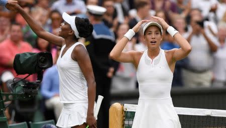 Tennis - Wimbledon - London, Britain - July 15, 2017 Spain’s Garbine Muguruza celebrates winning the final against Venus Williams of the U.S. REUTERS/Tony O'Brien