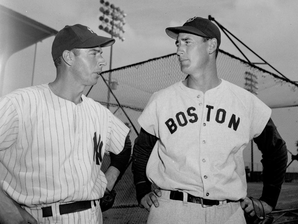 Joe DiMaggio (left) and Ted Williams accomplished feats during the 1941 season that may never be topped.