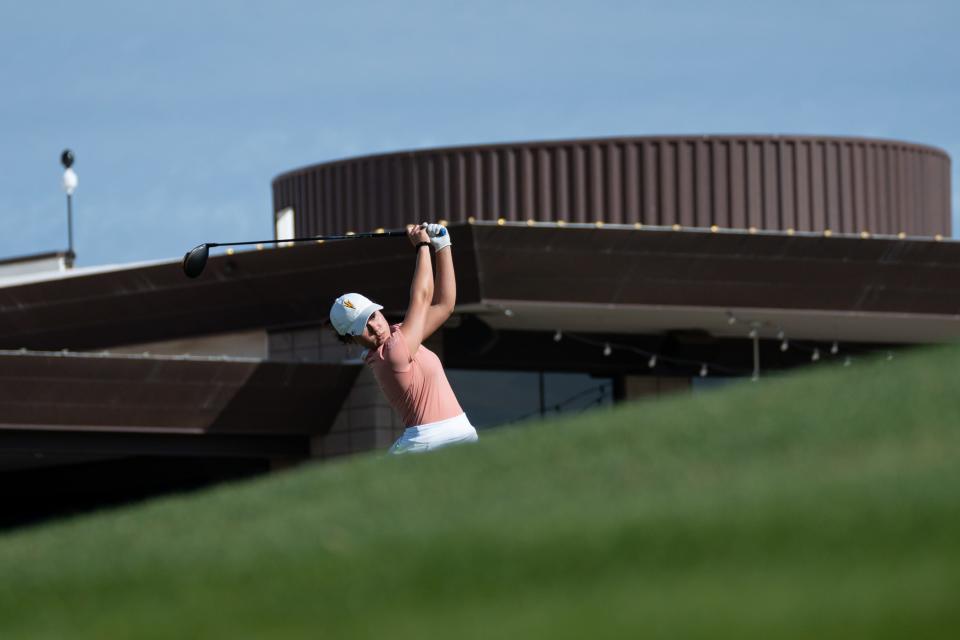 Ashley Menne of Arizona State University tees off at the 10th hole at Papago Golf Club during the "Dual in the Desert" match on Feb. 25, 2024, in Phoenix.