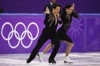 Figure Skating - Pyeongchang 2018 Winter Olympics - Ice Dance short dance competition - Gangneung Ice Arena - Gangneung, South Korea - February 19, 2018 - Tessa Virtue and Scott Moir of Canada perform. REUTERS/Phil Noble