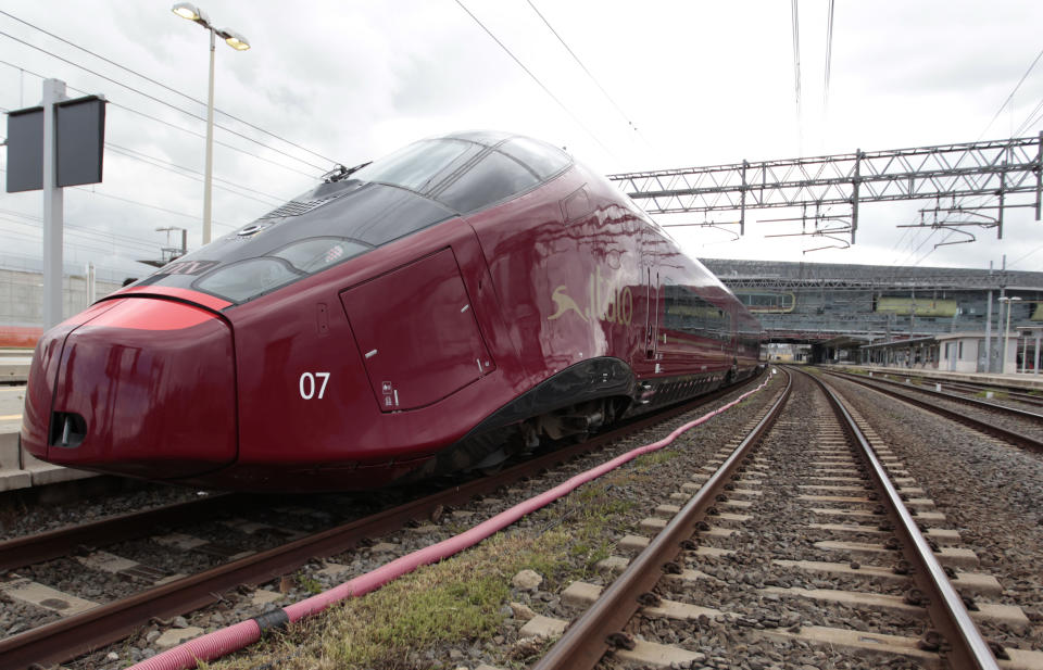 FILE - This Friday, April 20, 2012 file photo shows the NTV high speed train Italo as it waits to depart Rome's Tiburtina railway station on its inaugural trip to Naples. Fundamental change is underway in Europe, as crisis bites and voters revolt at the polls. An entire way of life is under threat as hard times take a toll in areas that have long been central to the continent’s view of itself: state protections; sophisticated lifestyle; shiny infrastructure; health care; a secure retirement; and more broadly, a sense of being the world’s elite. (AP Photo/Gregorio Borgia, file)