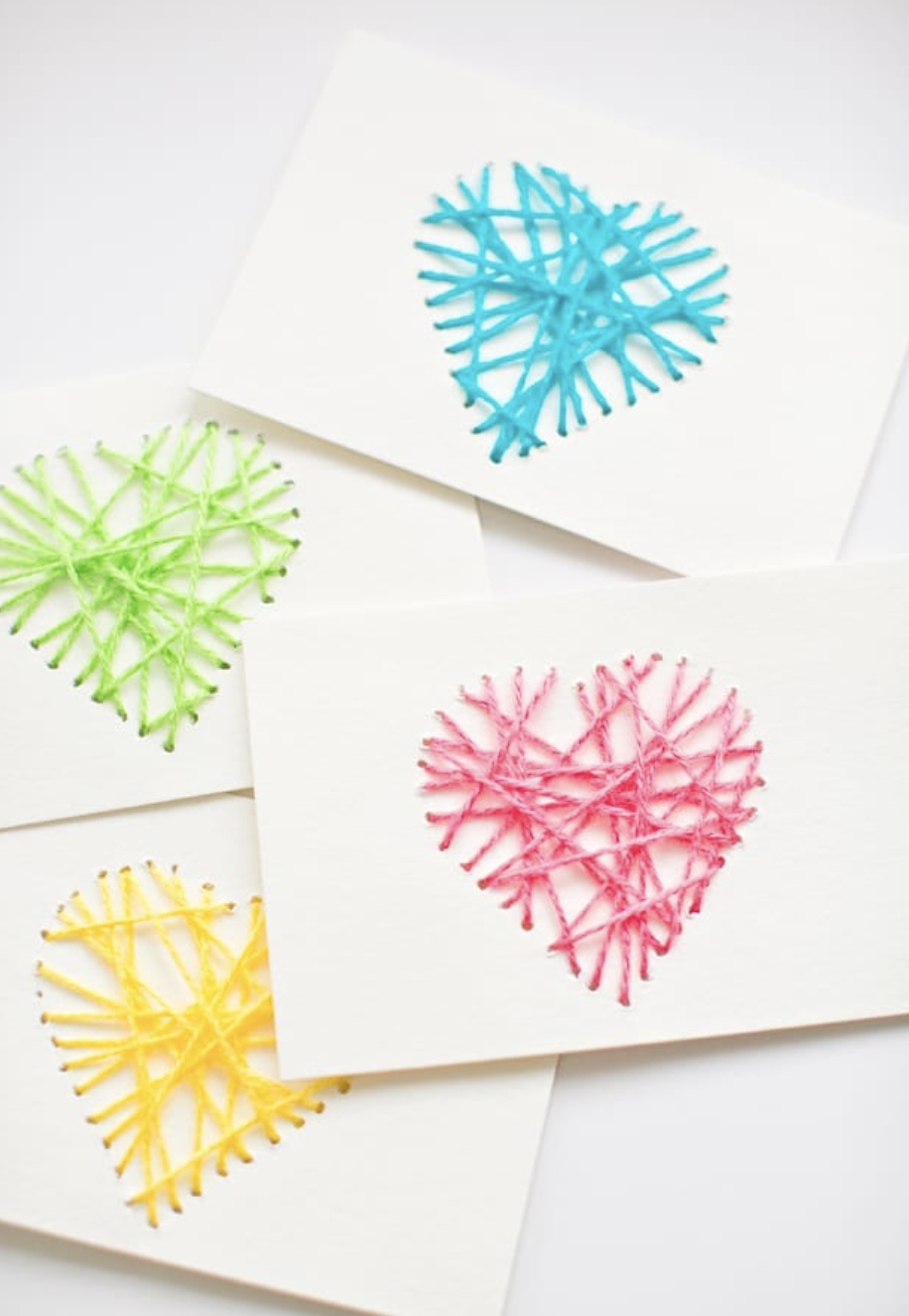 <p>You don't need to be an expert crafter to make this card. Just take some colorful thread to stitch a heart on the front and fill the inside with a note that's equally as sweet.</p><p><em><a href="https://www.hellowonderful.co/post/make-string-heart-yarn-cards/" rel="nofollow noopener" target="_blank" data-ylk="slk:Get the tutorial at Hello Wonderful »;elm:context_link;itc:0;sec:content-canvas" class="link ">Get the tutorial at Hello Wonderful »</a></em> </p>