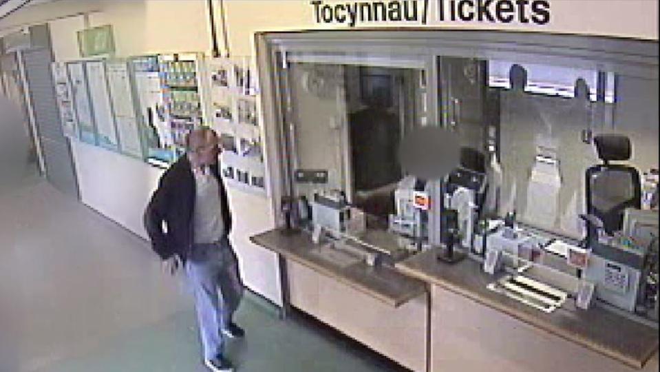 David Gaut, 54, is seen buying tickets at a train station in Caerphilly just hours before his death.