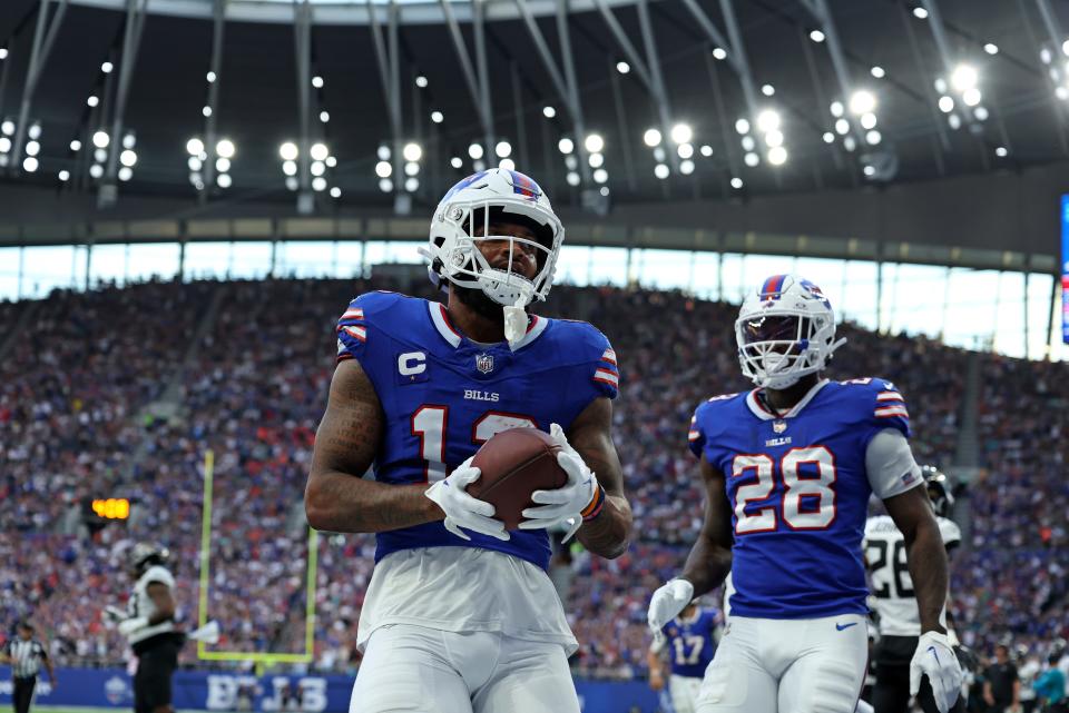 Buffalo Bills wide receiver Gabe Davis (13) reacts after scoring a touchdown during an NFL football game between Jacksonville Jaguars and Buffalo Bills at the Tottenham Hotspur stadium in London, Sunday, Oct. 8, 2023. (AP Photo/Ian Walton)