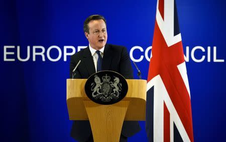 British Prime Minister David Cameron addresses the media after a European Union leaders summit in Brussels, Belgium, February 19, 2016. REUTERS/Dylan Martinez