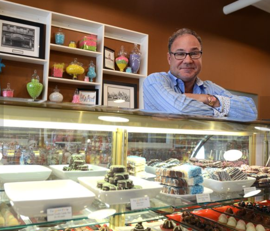 Todd May, owner of The Sweet Tooth of Marine City, stands at the counter in his popular candy store in 2016. He is located beside Popcorn Paradise and promises that, between the two shops, they can satisfy pretty much any craving.
