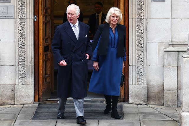 <p>Peter Nicholls/Getty Images</p> King Charles and Queen Camilla leave The London Clinic on Jan. 29.