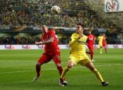 Football Soccer - Villarreal v Liverpool - UEFA Europa League Semi Final First Leg - El Madrigal Stadium, Villarreal, Spain - 28/4/16 Liverpool's Alberto Moreno in action with Villarreal's Denis Suarez Reuters / Albert Gea Livepic