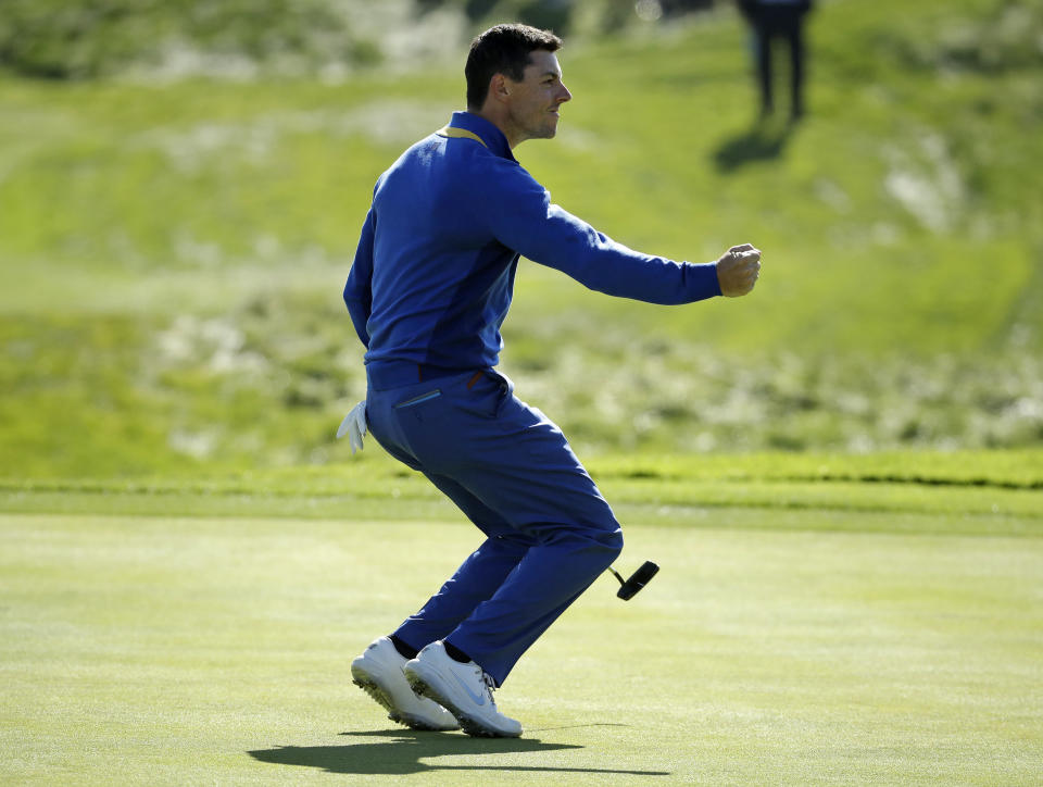 Europe's Rory McIlroy reacts after holing a putt to halve the 5th hole during a singles match on the final day of the 42nd Ryder Cup at Le Golf National in Saint-Quentin-en-Yvelines, outside Paris, France, Sunday, Sept. 30, 2018. (AP Photo/Matt Dunham)