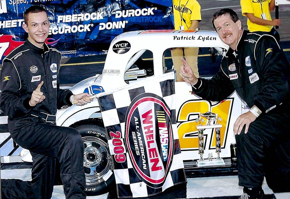 Patrick Lyden, left, and his father, Bill, pose in a 2009 photo after Patrick won a Whelen All-American Series race in their No. 21 Legends car. Patrick Lyden, who graduated from Cathedral Prep the following year, has worked in NASCAR for the past six years. He was in charge of tires for the No. 1 car driven by Ross Chastain during the 2022 NASCAR Cup Series. Chastain finished second in the overall standings.