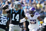 Minnesota Vikings outside linebacker Anthony Barr (55) pressures Carolina Panthers quarterback Sam Darnold (14) during the first half of an NFL football game, Sunday, Oct. 17, 2021, in Charlotte, N.C. (AP Photo/Gerald Herbert)