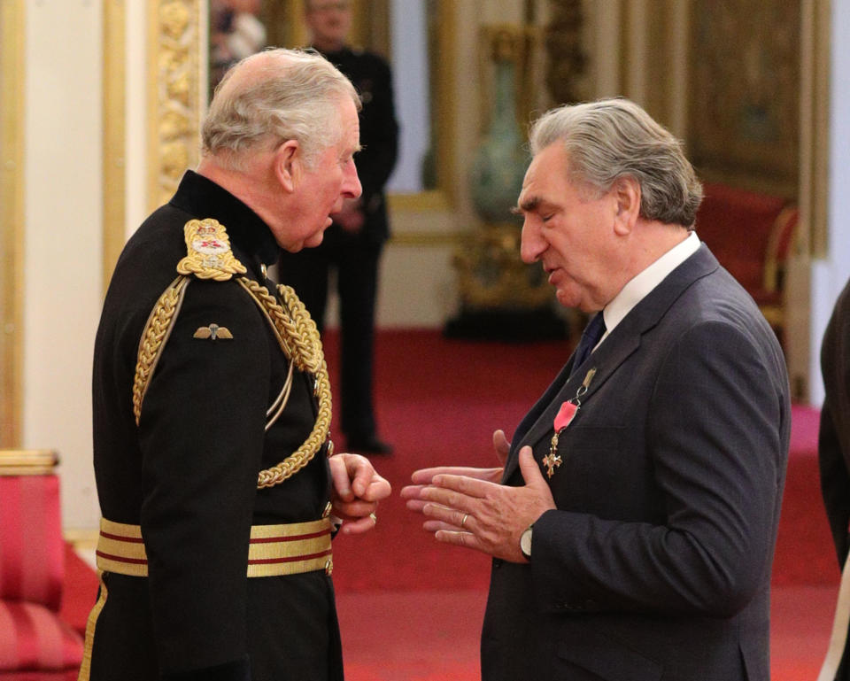 Chatting to Prince Charles as he receives the award – credit PA.