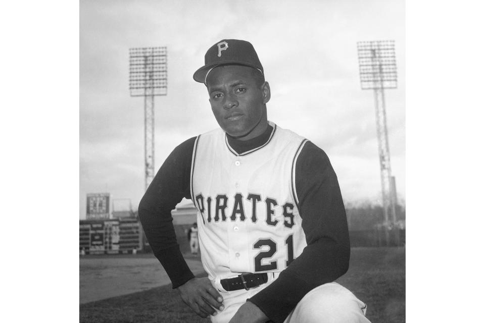 FILE - Roberto Clemente of the Pittsburgh Pirates is seen in Tampa, Fla., March 3, 1963. Major League Baseball celebrates its annual Roberto Clemente Day, Thursday, Sept. 15, 2022, honoring the Hall of Fame outfielder in the 50th anniversary year of his tragic death in a plane crash while attempting to deliver relief supplies to earthquake victims in Nicaragua. (AP Photo/Preston Stroup, File)