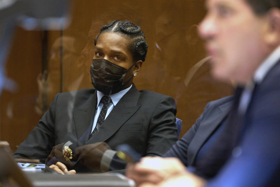 Rakim Mayers, aka A$AP Rocky, sits during a preliminary hearing in the Clara Shortridge Foltz Criminal Justice Center in Los Angeles, Monday, Nov. 20, 2023. A judge is set to hear evidence Monday against the 35-year-old rap star and father of two children with Rihanna as he decides whether he should stand trial on two felony counts of assault with a semiautomatic firearm. He has pleaded not guilty. (Allison Dinner/Pool Photo via AP)