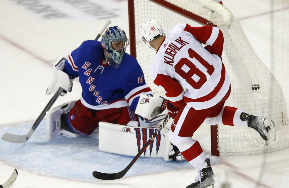 CORRECTS BY REMOVING THIRD PERIOD - Detroit Red Wings left wing Dominik Kubalik (81) watches his winning overtime goal hit the back of the net as New York Rangers goalie Jaroslav Halak looks back during an NHL hockey game Sunday, Nov. 6, 2022, in New York. (AP Photo/John Munson)