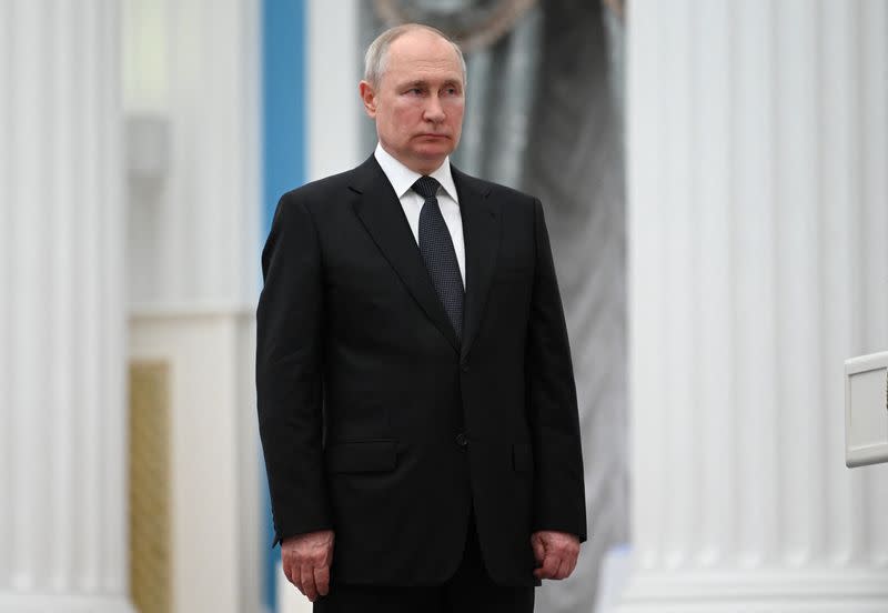 Russian President Putin takes part in an awarding ceremony in Moscow