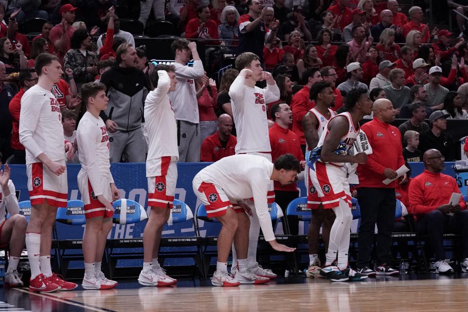 Arizona Wildcats react from the sidelines during the first half against Long Beach State 49ers in the first round of the 2024 NCAA Tournament at Vivint Smart Home Arena-Delta Center in Salt Lake City on March 21, 2024.