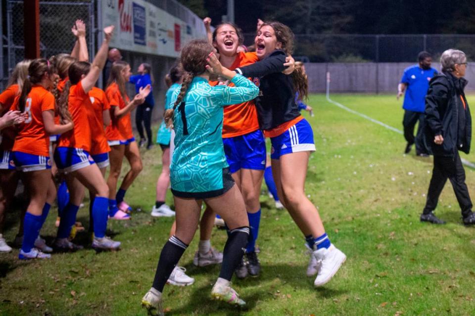 Members of the Gulfport girls soccer team celebrate after their teammate scored a goal in the second half of the 6A South State Championship game in Gulfport on Tuesday, Jan. 31, 2023.