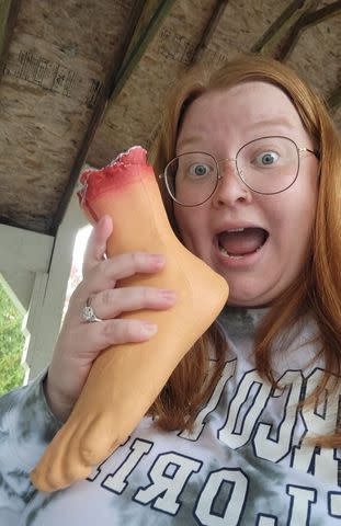 <p>Sierra Diller</p> Sierra Diller holds up a prosthetic foot in preparation to get her foot amputated