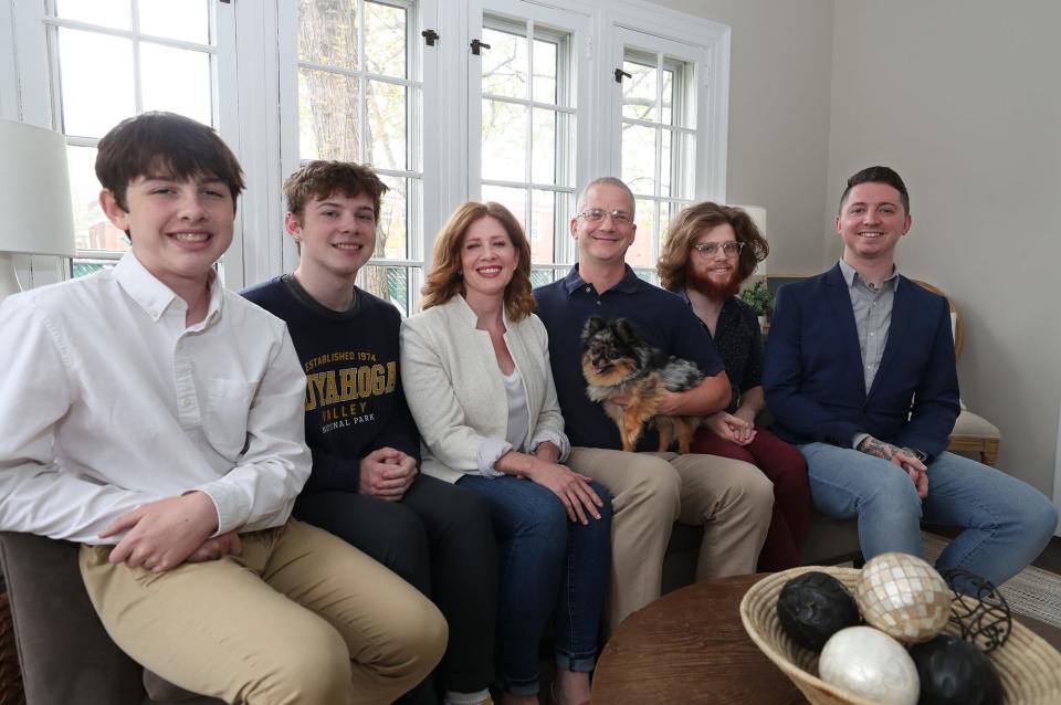 Drs. Katie and Curtis Clark with their sons (from left) Max, Colin, Andrew and Brian, along with their dog, Pawn.