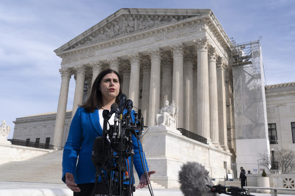 Colorado Secretary of State Jena Griswold speaks in front of the U.S. Supreme Court, Thursday, Feb. 8, 2024, in Washington. The U.S. Supreme Court on Thursday will take up a historic case that could decide whether Donald Trump is ineligible for the 2024 ballot under Section 3 of the 14th Amendment. (AP Photo/Manuel Balce Ceneta)