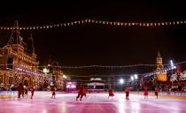 Skaters perform during the opening of an outdoor skating rink in the Red Square in Moscow