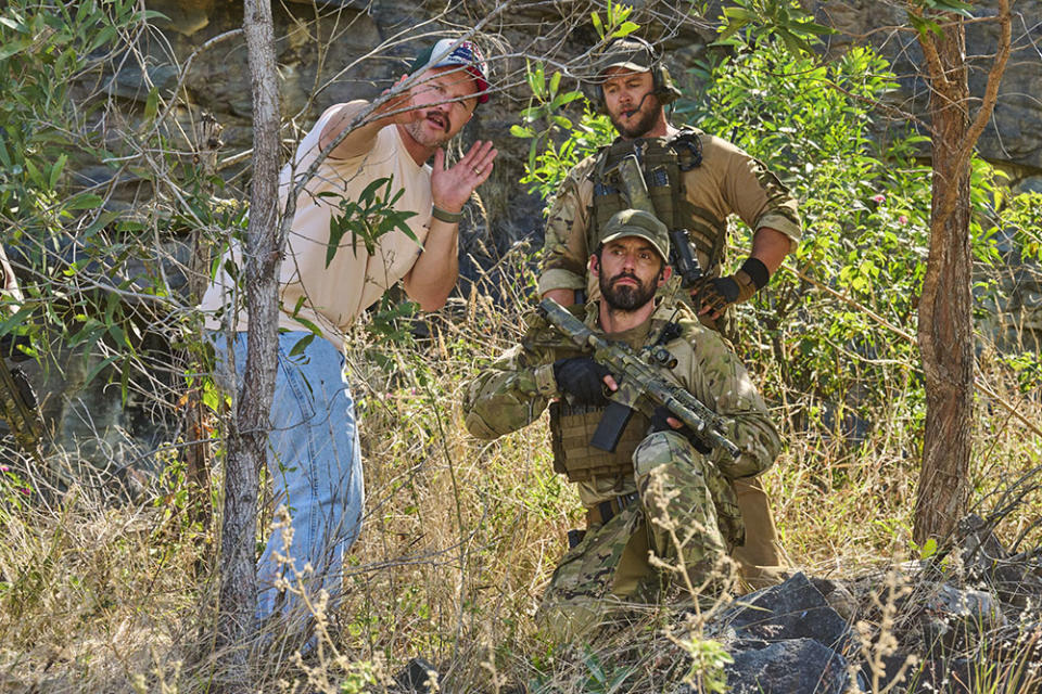 (L-R) Director/Co-Writer William Eubank, Milo Ventimiglia and Luke Hemsworth behind the scenes of 'LAND OF BAD'.