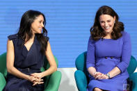 <p>Meghan Markle, left, and Kate, Duchess of Cambridge laugh during the first annual Royal Foundation Forum in London. Under the theme ‘Making a Difference Together’, the event will showcase the programmes run or initiated by The Royal Foundation. (Chris Jackson/Pool via AP) </p>