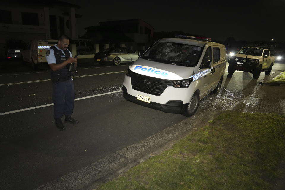 A policeman stands guard outside a church where a bishop and churchgoers were reportedly stabbed in Sydney Australia, Monday, April 15, 2024. (AP Photo/Mark Baker)