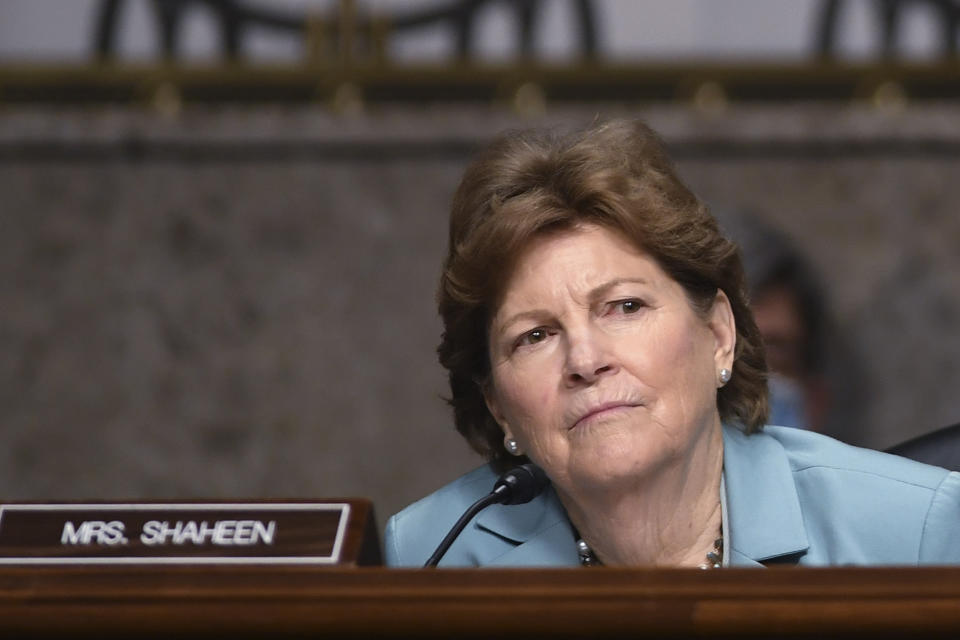 FILE - In this May 7, 2020, file photo Sen. Jeanne Shaheen, D-NH, listens during a Senate Armed Services Committee hearing on Capitol Hill in Washington. At least 10 lawmakers and three congressional caucuses have ties to organizations that received federal coronavirus aid, according to government data released this week. A law firm owned by the husband of Shaheen, received money. (Kevin Dietsch/Pool via AP, File)