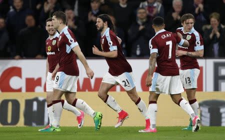 Britain Football Soccer - Burnley v Stoke City - Premier League - Turf Moor - 4/4/17 Burnley's George Boyd celebrates scoring their first goal with teammates Action Images via Reuters / Carl Recine Livepic