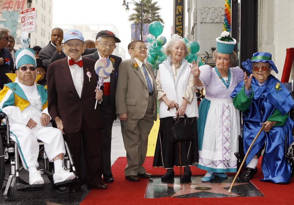 FILE - In this Nov. 20, 2007, file photo, The Munchkins from "The Wizard of Oz" pose as they honored with a star on the Hollywood Walk of Fame at Grauman's Chinese Theatre, site of the film's 1939 premiere, in Los Angeles. The Munchkins cast members, from left: Clarence Swensen, a Munchkin soldier, Jerry Maren, part of the Lollipop Guild; Mickey Carroll, the Town Crier; Karl Slover, the Main Trumpeter; Ruth Duccini, a Munchkin villager; Margaret Pelligrini, the "sleepyhead" Munchkin and Meinhardt Raabe, the coroner. Ruth Robinson Duccini, 95, one of the two surviving Munchkins from the legendary film, died early Thursday, Jan. 16, 2014, in Las Vegas. (AP Photo/Damian Dovarganes, File)