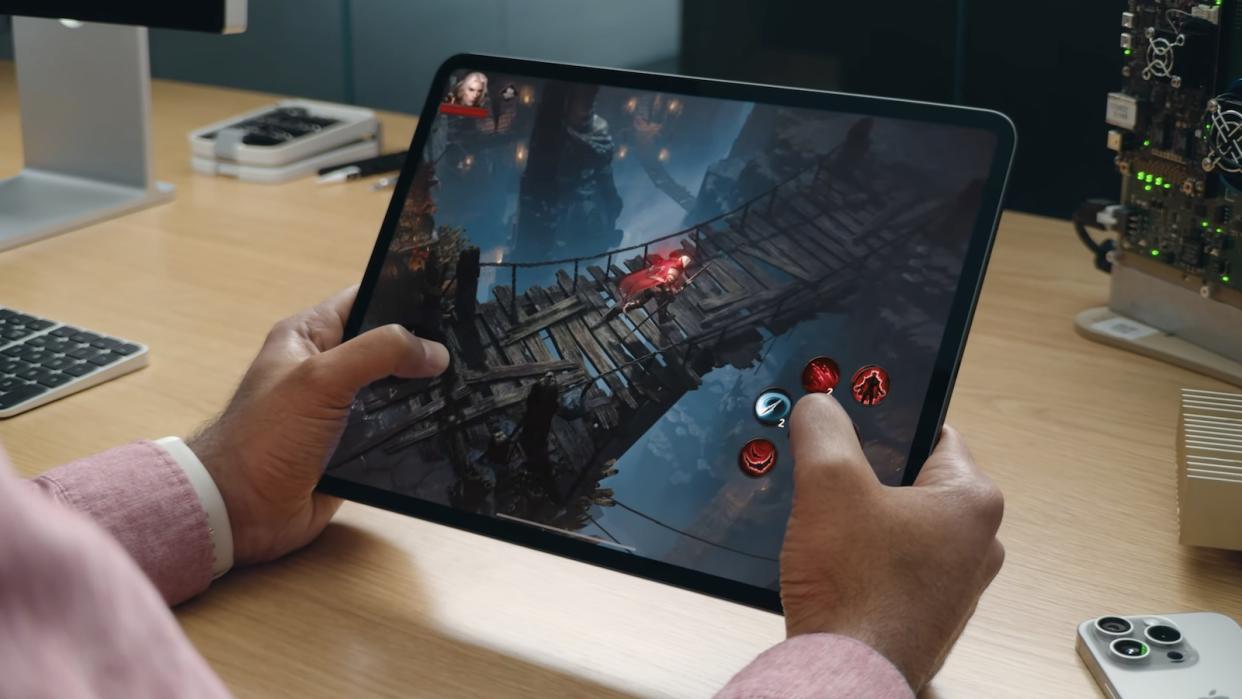 A photo of someone playing a game on the new iPad Pro. 