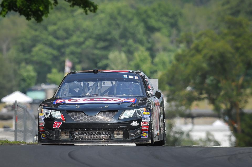 Former NASCAR driver Joe Nemechek approaches Turn 6 during qualifying at the WeatherTech International Challenge vintage races Friday at Road America in Elkhart Lake