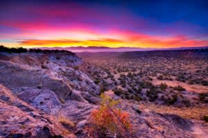 <span class="article__caption">This kind of sunrise over Bandelier National Monument would never get old.</span> (Photo: Dean_Fikar / iStock / Getty Images Plus via Getty Images)