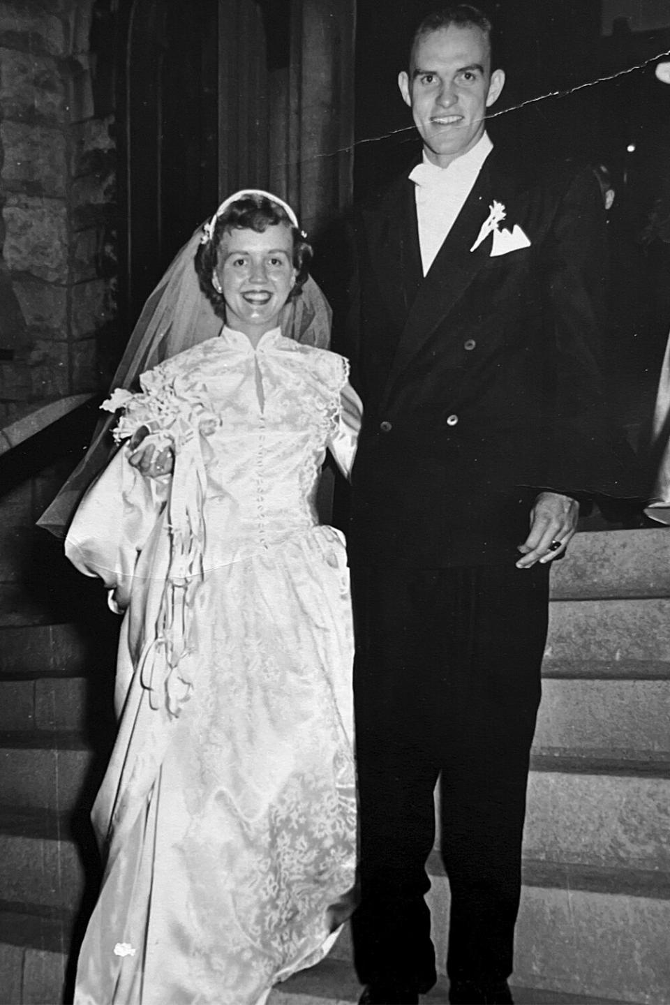 Adele Larson, who in 1950 bought the wedding dress that has been worn by eight women in her family, married Roy Stoneberg, shown here, in 1950. photography: Robert Photography.