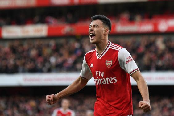 Martinelli celebrates scoring for Arsenal (AFP via Getty Images)