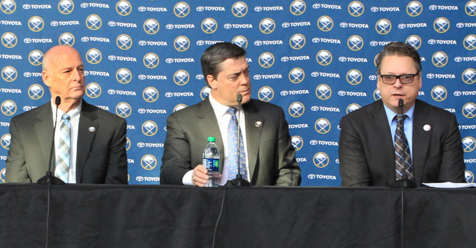 Pat Lafontainte, center, introduces Tim Murray, right, as the New General Manager of the Buffalo Sabres and Craig Patrick as the Special Assistant and Advisor to the Hockey Department, Thursday, Jan. 9, 2014, at the First Niagara Center in Buffalo, NY. (AP Photo/Nick LoVerde)