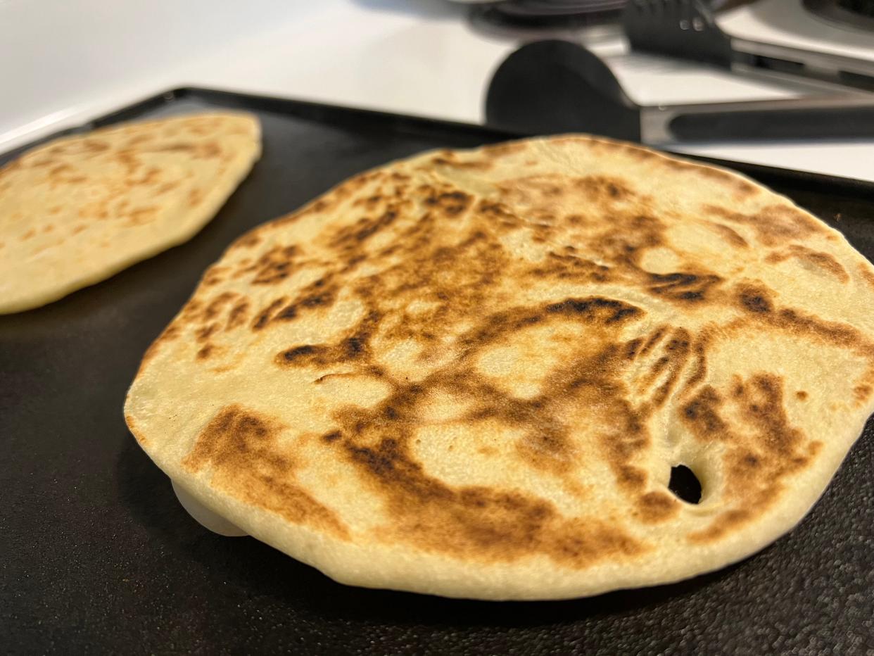 There might be a lot of rise and rest time to make these pitas, but every minute of it is worth it when biting into a fresh, hot pita right off the griddle.