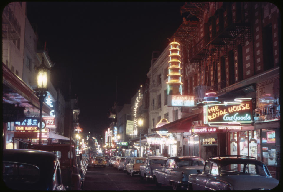 Street Scene at night in San Francisco's Chinatown in the mid-1950s. | Universal Images Group via Getty