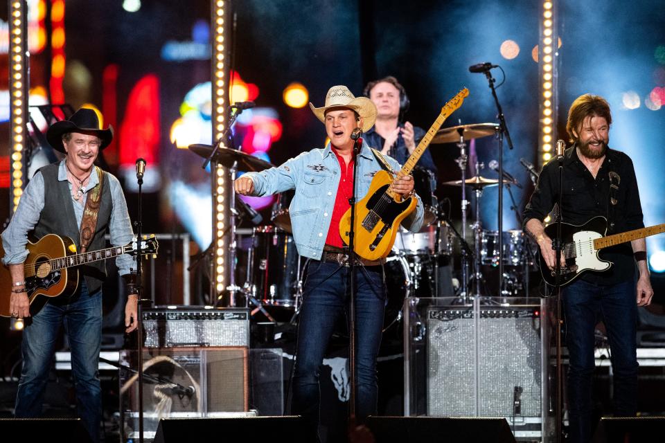 Brooks & Dunn perform with Jon Pardi, center, during a taping of 