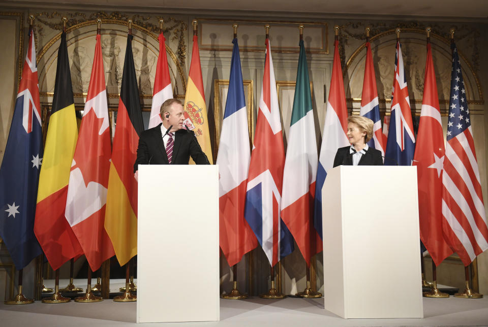 German minster of Defense Ursula von der Leyen, right, looks to United States Secretary of Defense Patrick Shanahan at a press conference during the International Security Conference in Munich, Germany, Friday, Feb. 15, 2019. (Tobias Hase/dpa via AP)