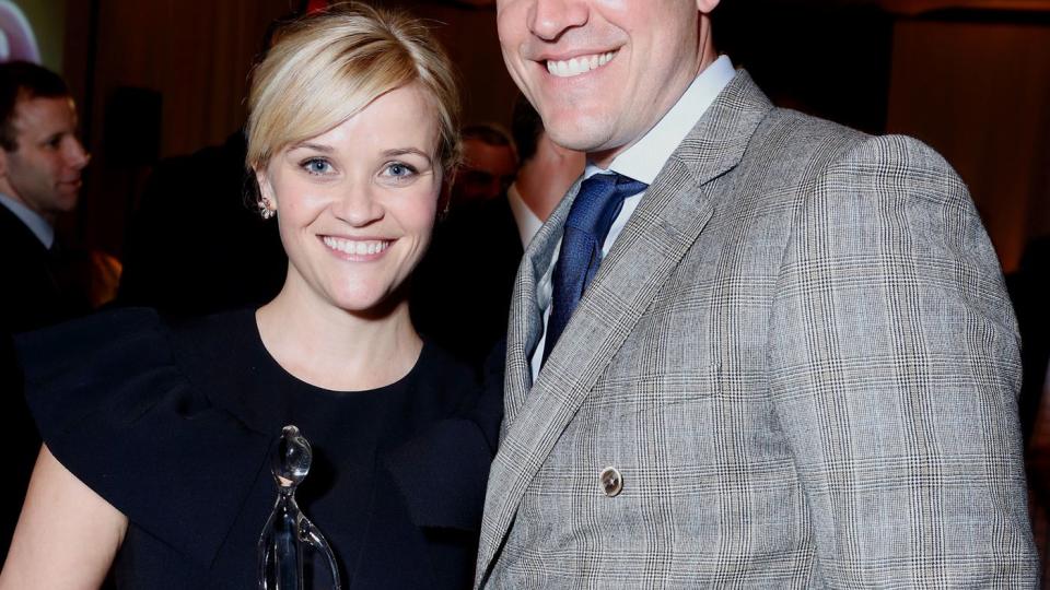 Reese Witherspoon and actor Jim Toth pose with the Grace Kelly Award during the 7th Annual March of Dimes Celebration of Babies, a Hollywood Luncheon, at the Beverly Hills Hotel on December 7, 2012 in Beverly Hills, California